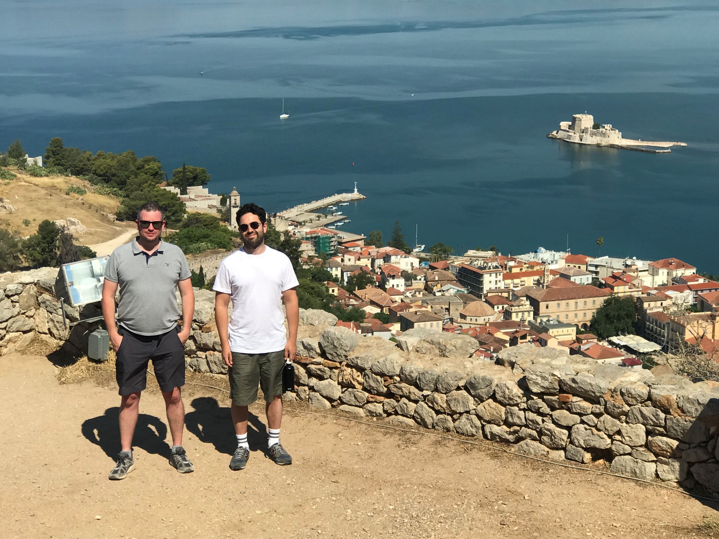 The winning poets at the Palamidi fortress with the town of Nafplio and Bourtzi in the background.