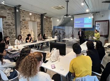 Participants attend a lecture and discussion session at CHS Greece in Nafplio.
