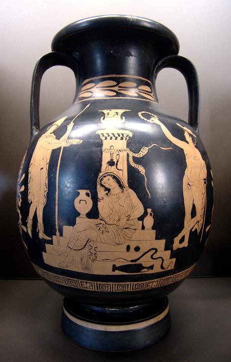 Ancient Greek red‑figure vase showing a mourning woman seated on the steps of a tomb, flanked by two standing figures making offerings, with vases and a serpent depicted at the base.